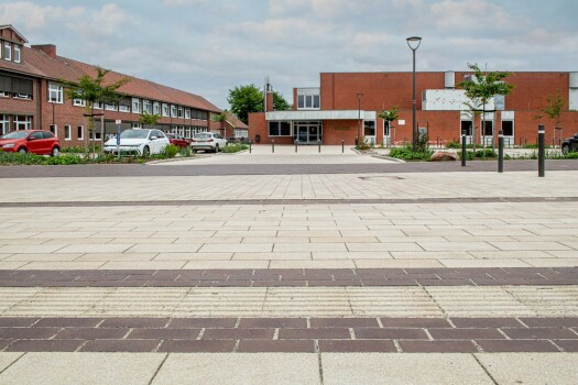 Garrel (D), School and sports center, Umbriano Granite beige, textured.