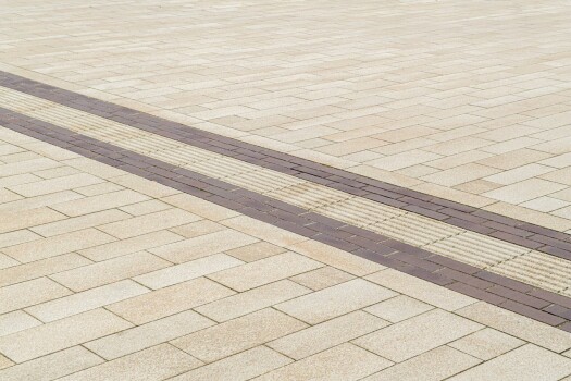 Garrel (D), School and sports center, Umbriano Granite beige, textured.